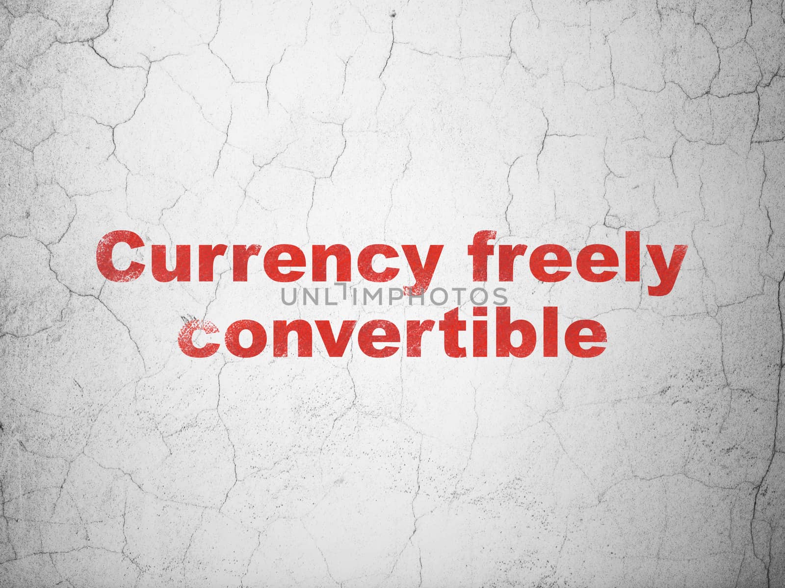 Money concept: Red Currency freely Convertible on textured concrete wall background