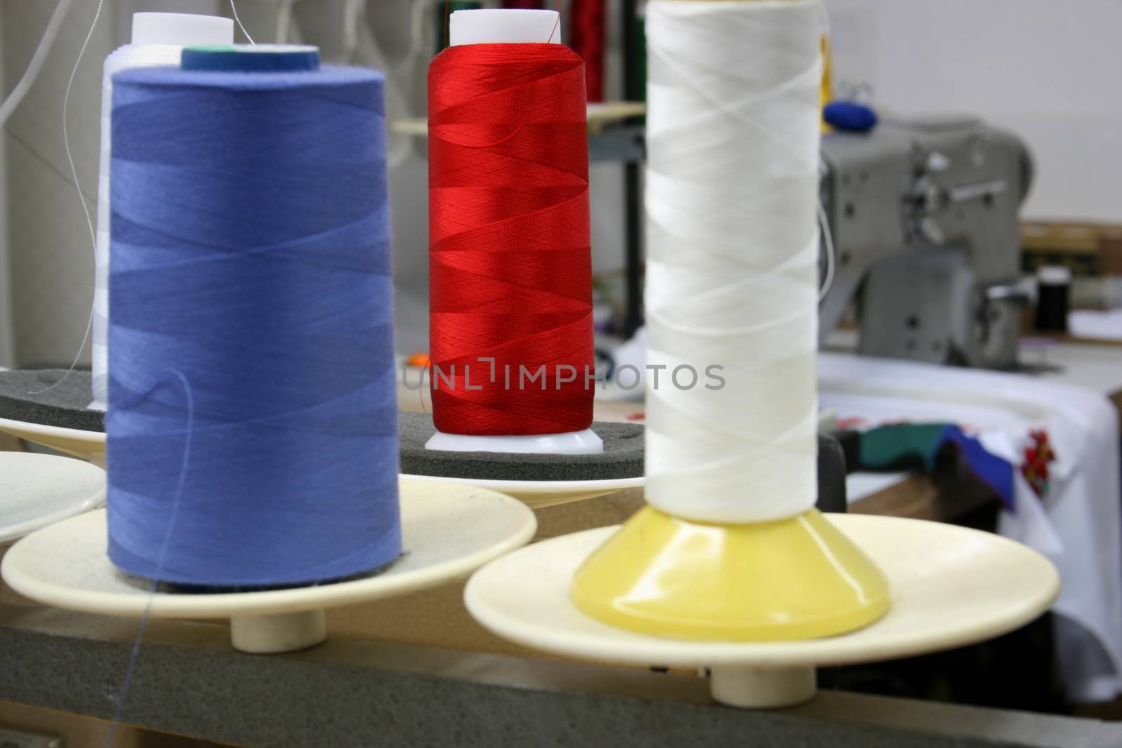 Colorful reels of threads. Shallow depth of field.