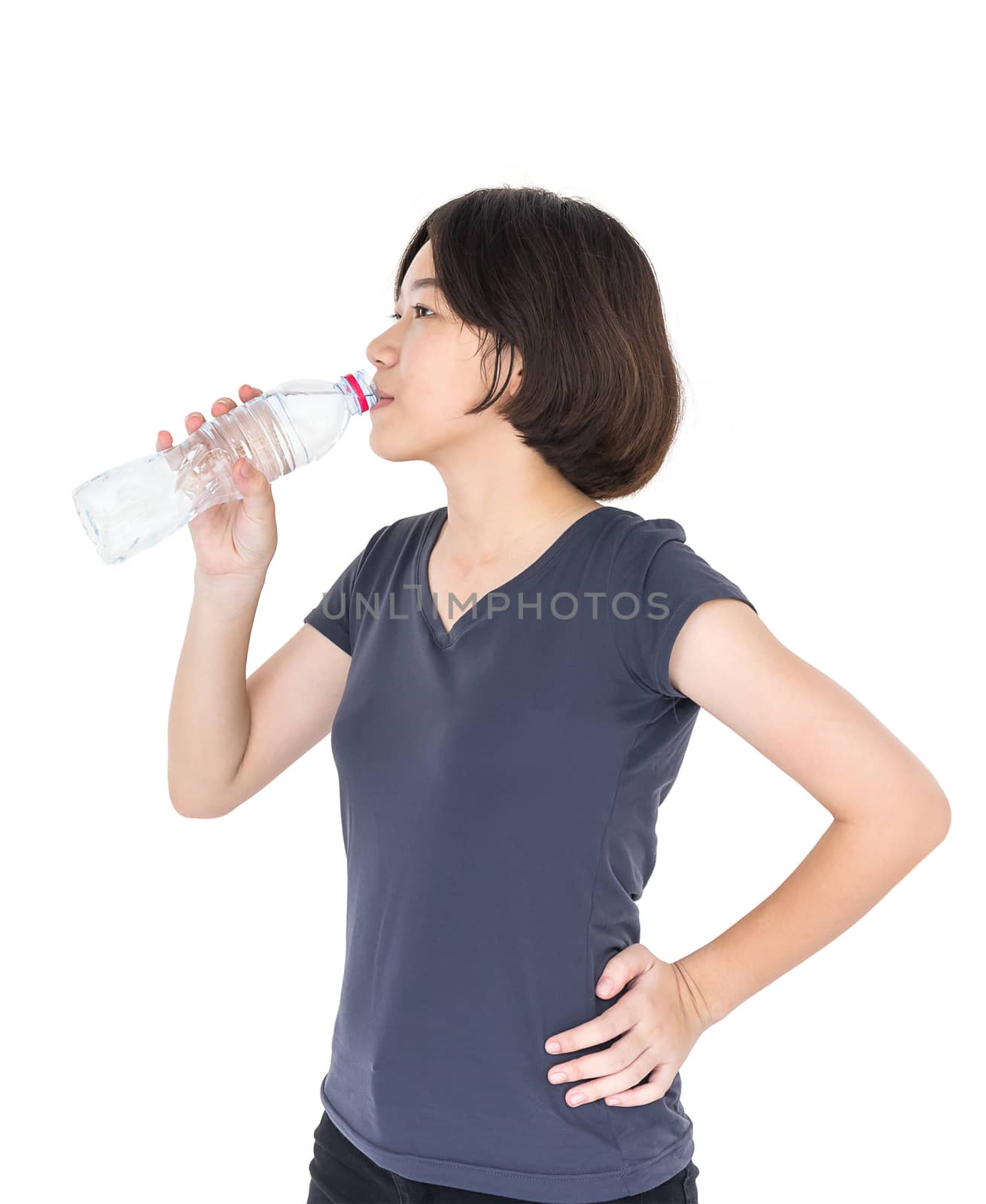 Asian woman drinking bottled water  by stoonn