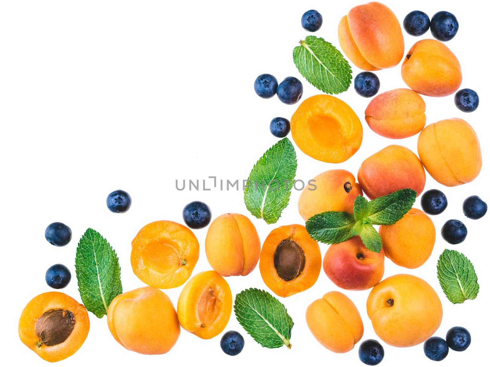 Apricot, blueberry and mint, isolated, top view, copy space by fascinadora