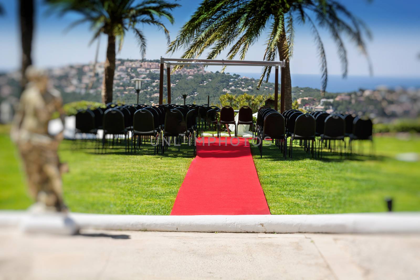 Red Carpet Event in front of a Mediterranean background