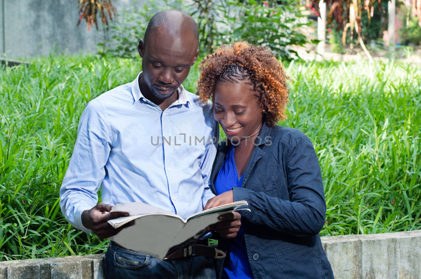 This young couple met in a park, converse about a magazine subject.