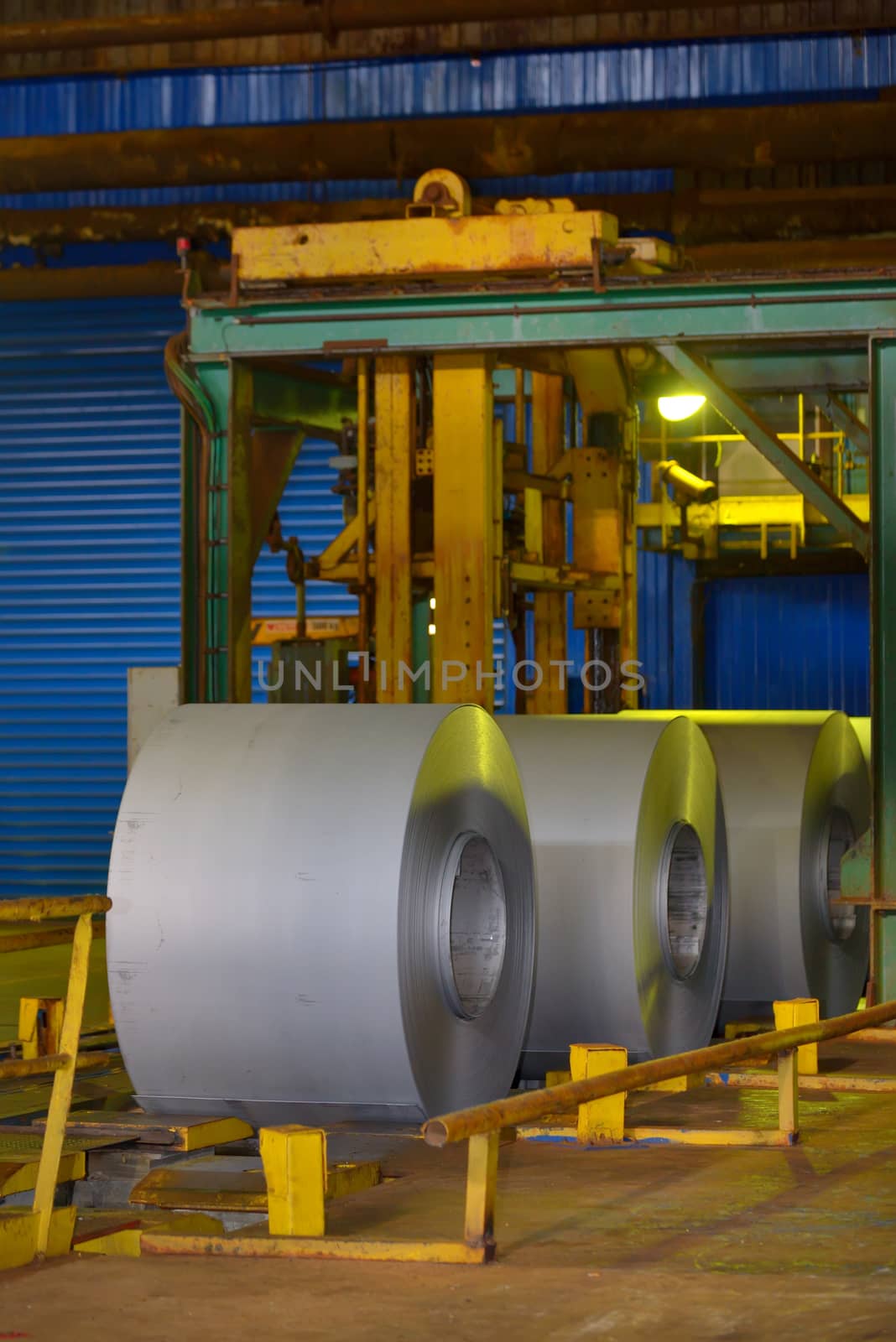 Rolls of metal coil inside of steel plant