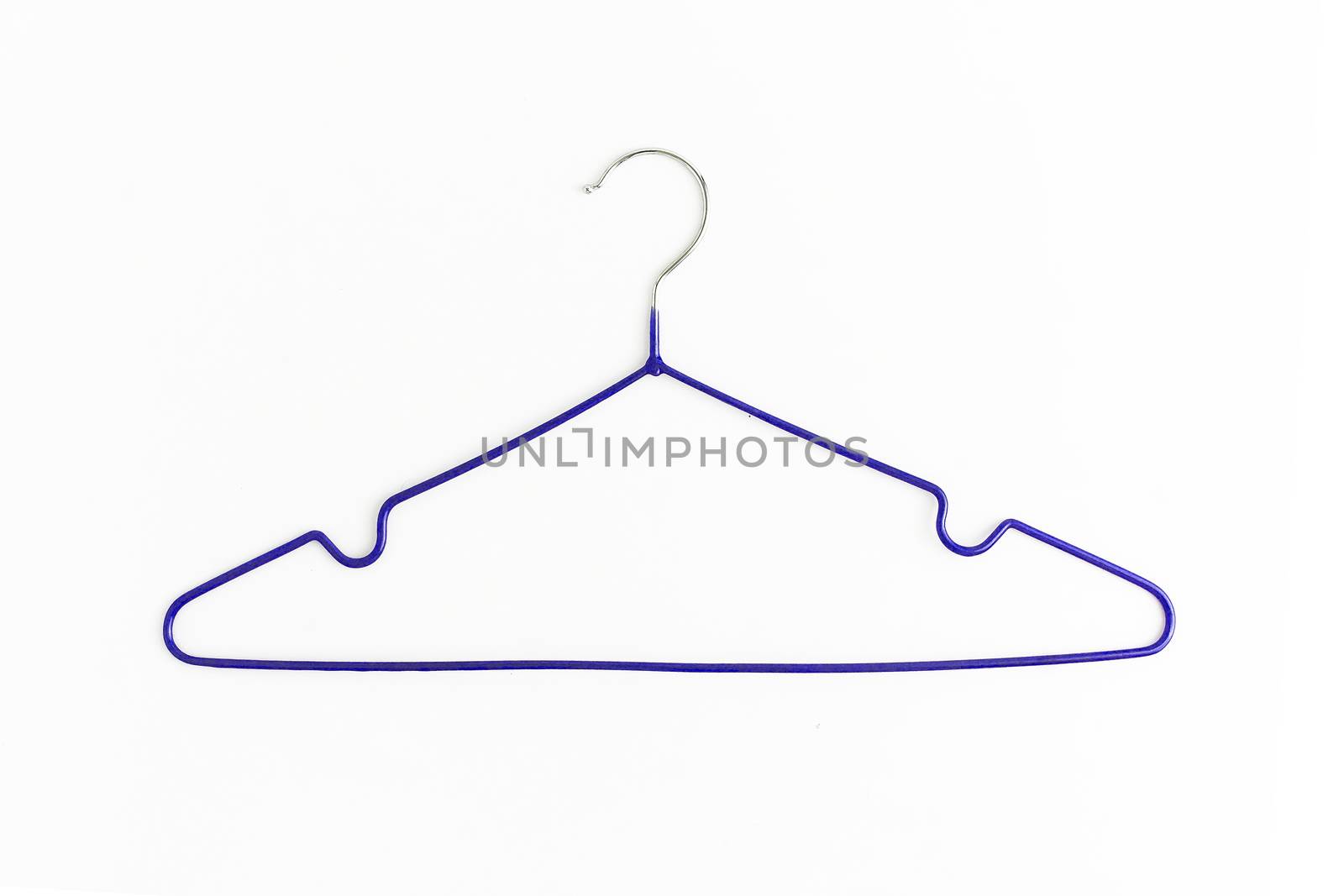 One colored metal hanger, isolated on white background, close-up.