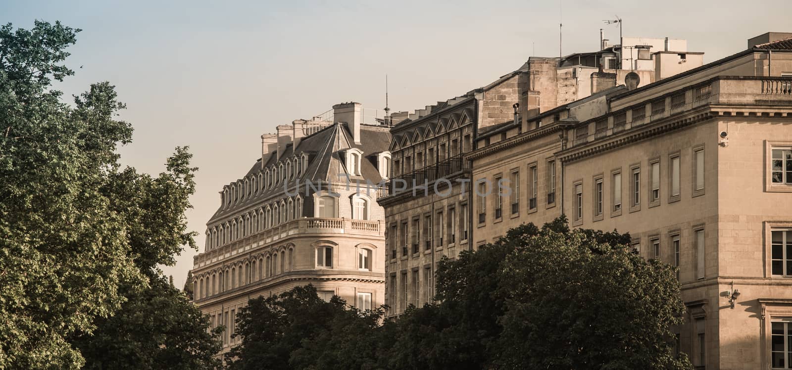 Typical Bordeaux architecture in the centre of Bordeaux, France. Decorative appartment building on spring day.