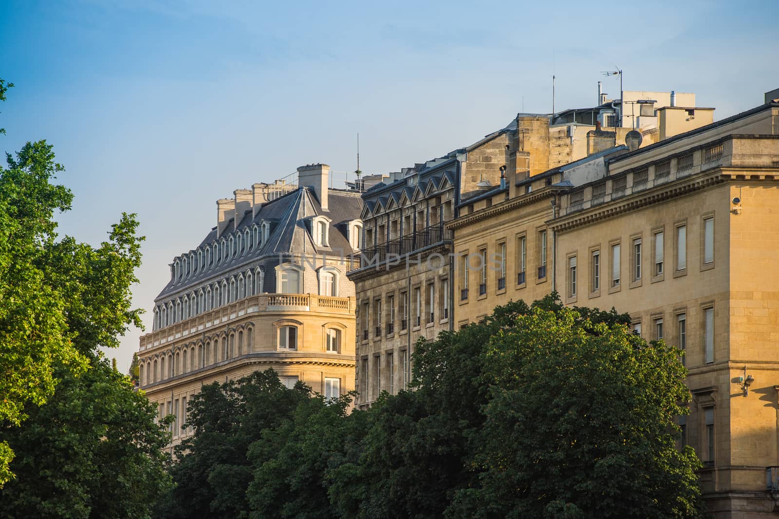 Typical Bordeaux architecture in the centre of Bordeaux, France. Decorative appartment building on spring day.