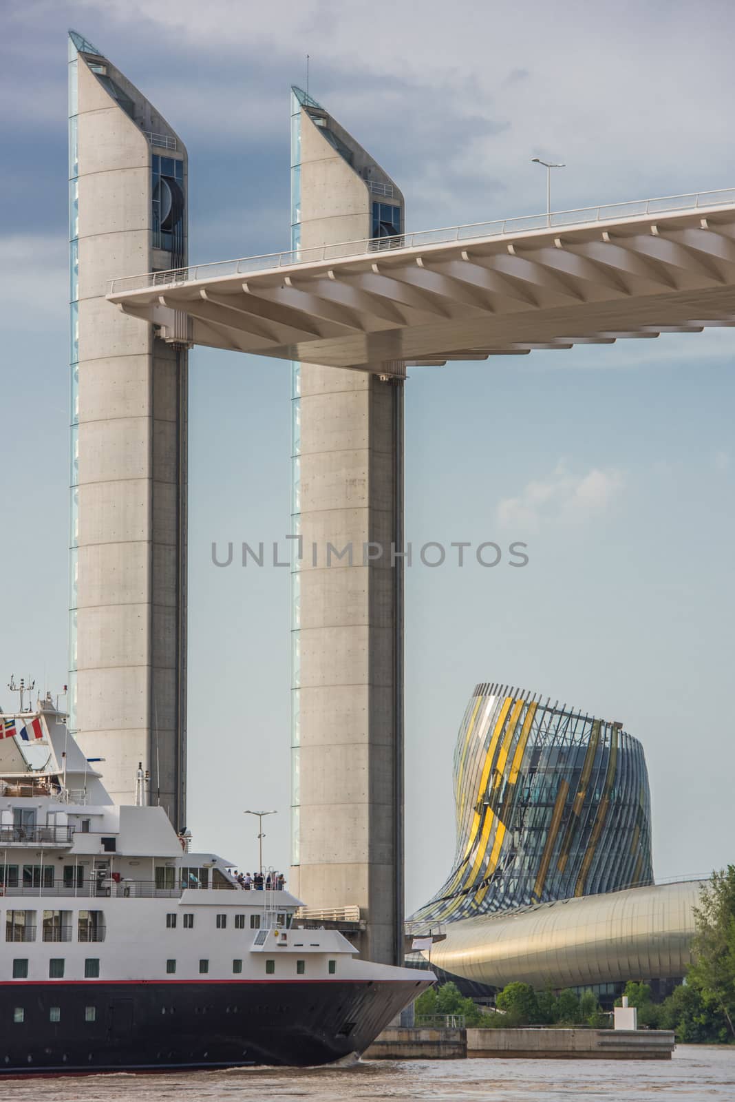 Bordeaux, Gironde, FRANCE, May 27, Luxury cruise ship crossing the Chaban Delmas bridge at the Cite du Vin, Bordeaux on May 27, 2017