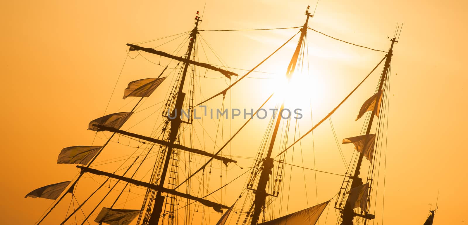 Sunset at sea on aboard the Yacht Sailing, Sails, three mats