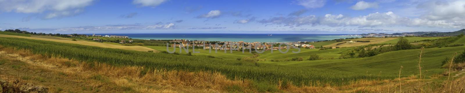 Aerial panoramic view of villages on the adriatic coast near Anc by Elenaphotos21