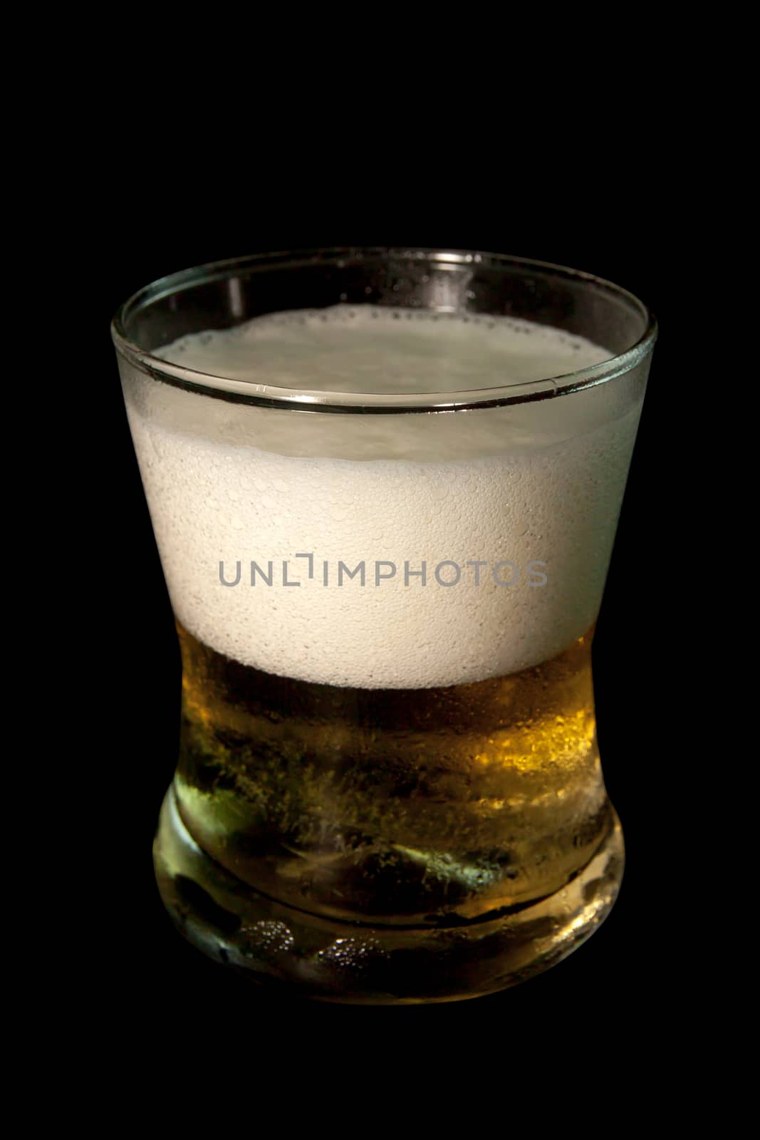 Beer in glass isolated on black background. Pour beer. objects with clipping paths.