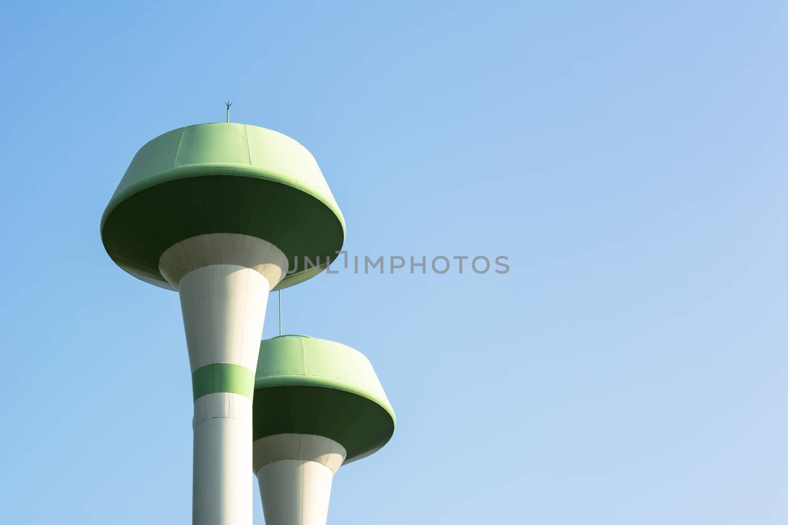 water tower with blue sky by ahimaone