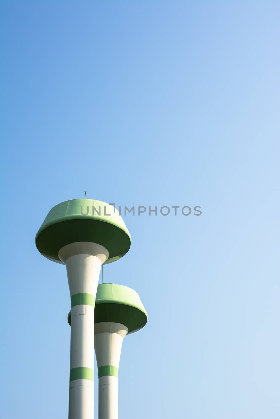 water tower with blue sky