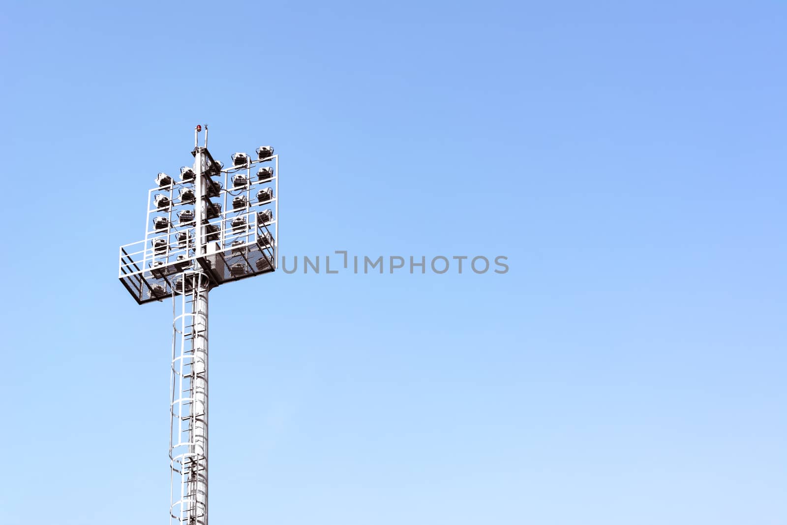 Stadium lights with sky for background