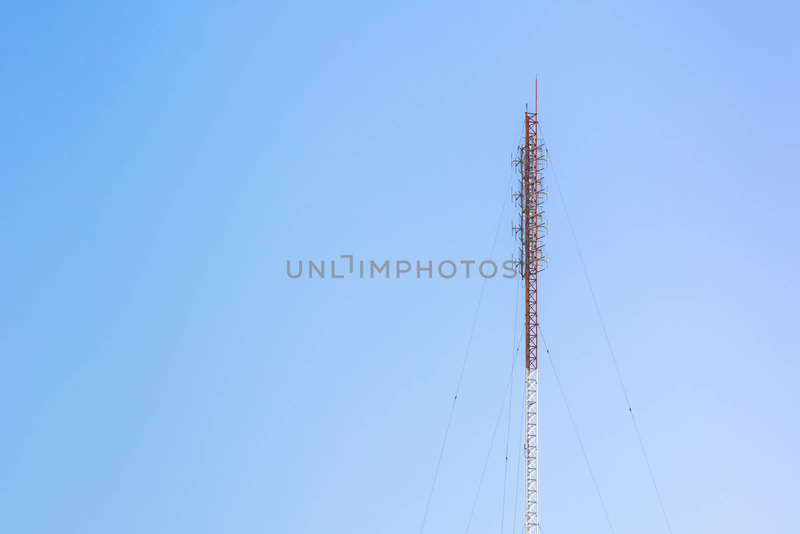 Telecommunication antenna tower, Radio antenna tower, Cellular antenna tower in blue sky background