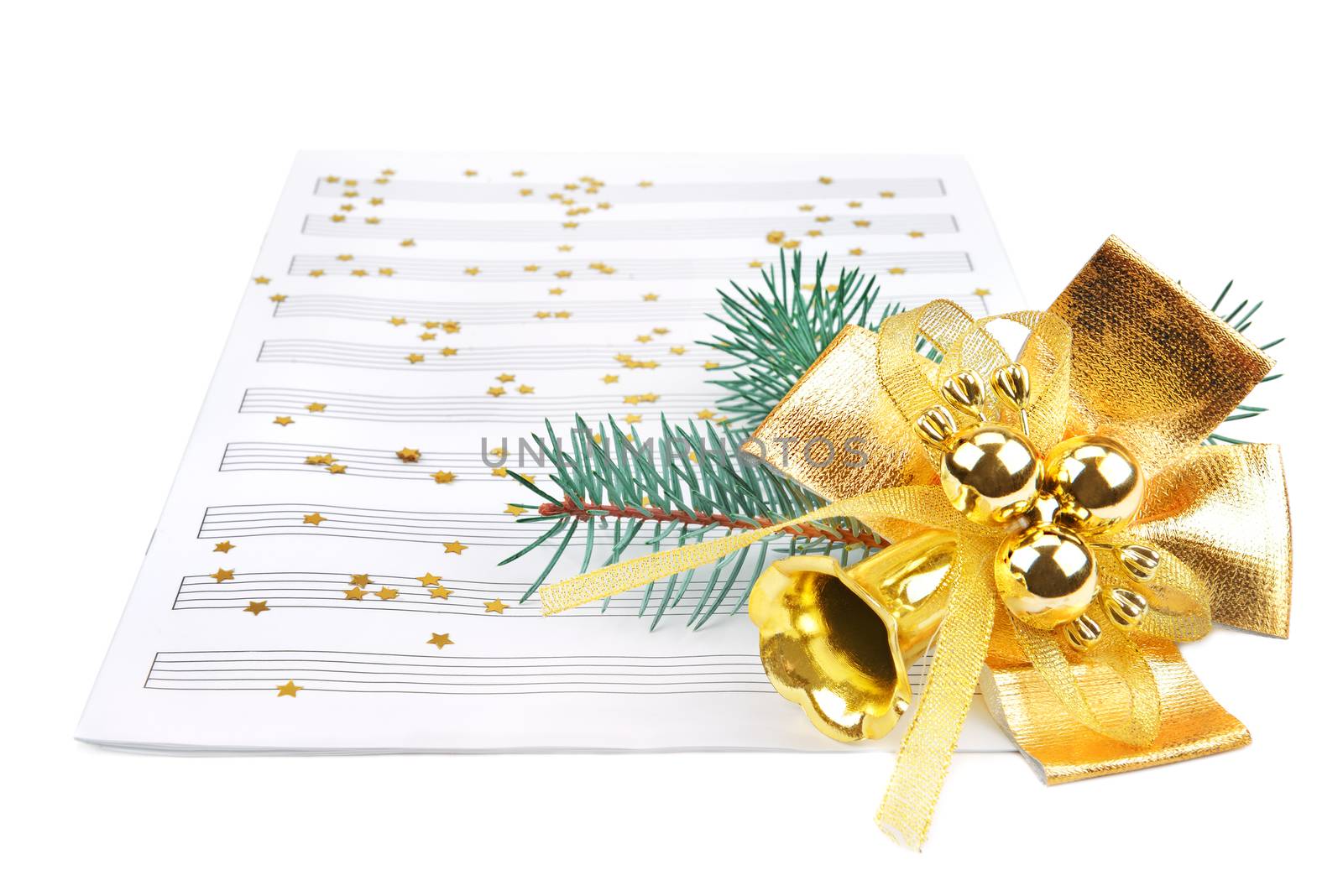 Christmas decorations and music sheet isolated on white background