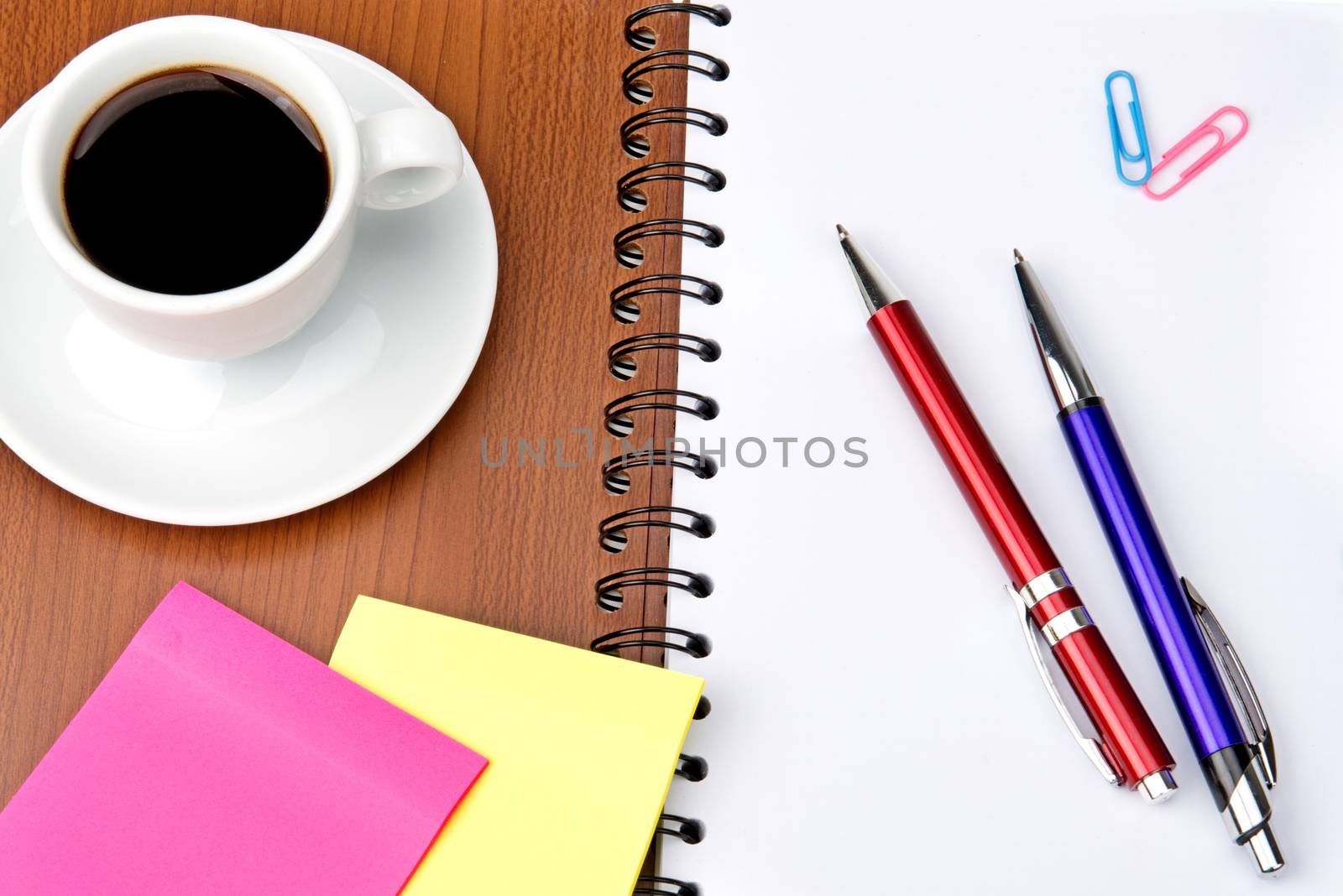 office supplies and coffee cup isolated on white background