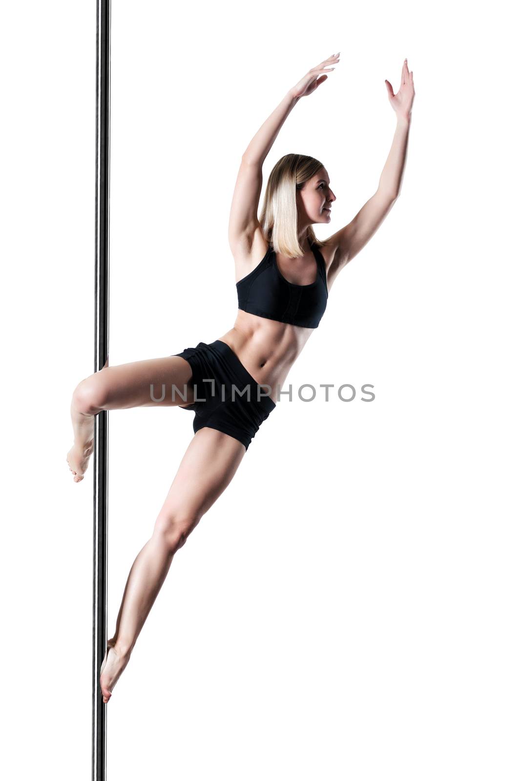 pole dance girl exercising and posing against white background