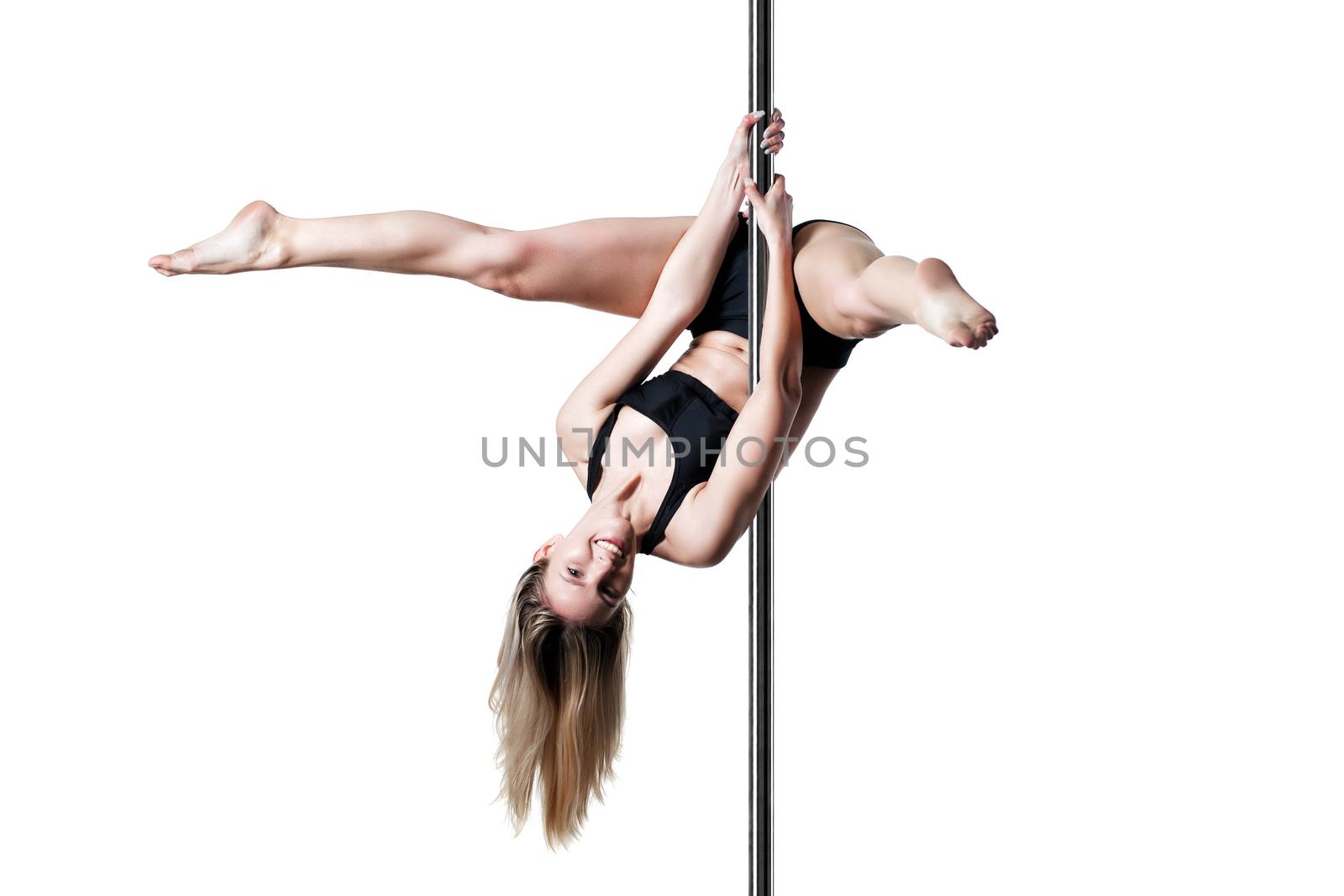 pole dance girl exercising and posing against white background