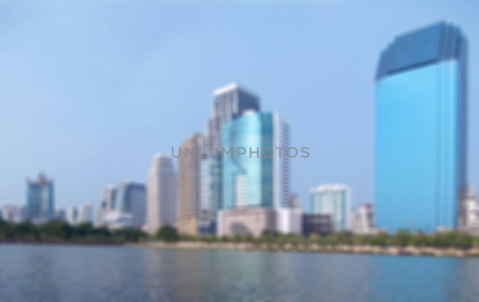 Blurred cityscape with lake by Exsodus