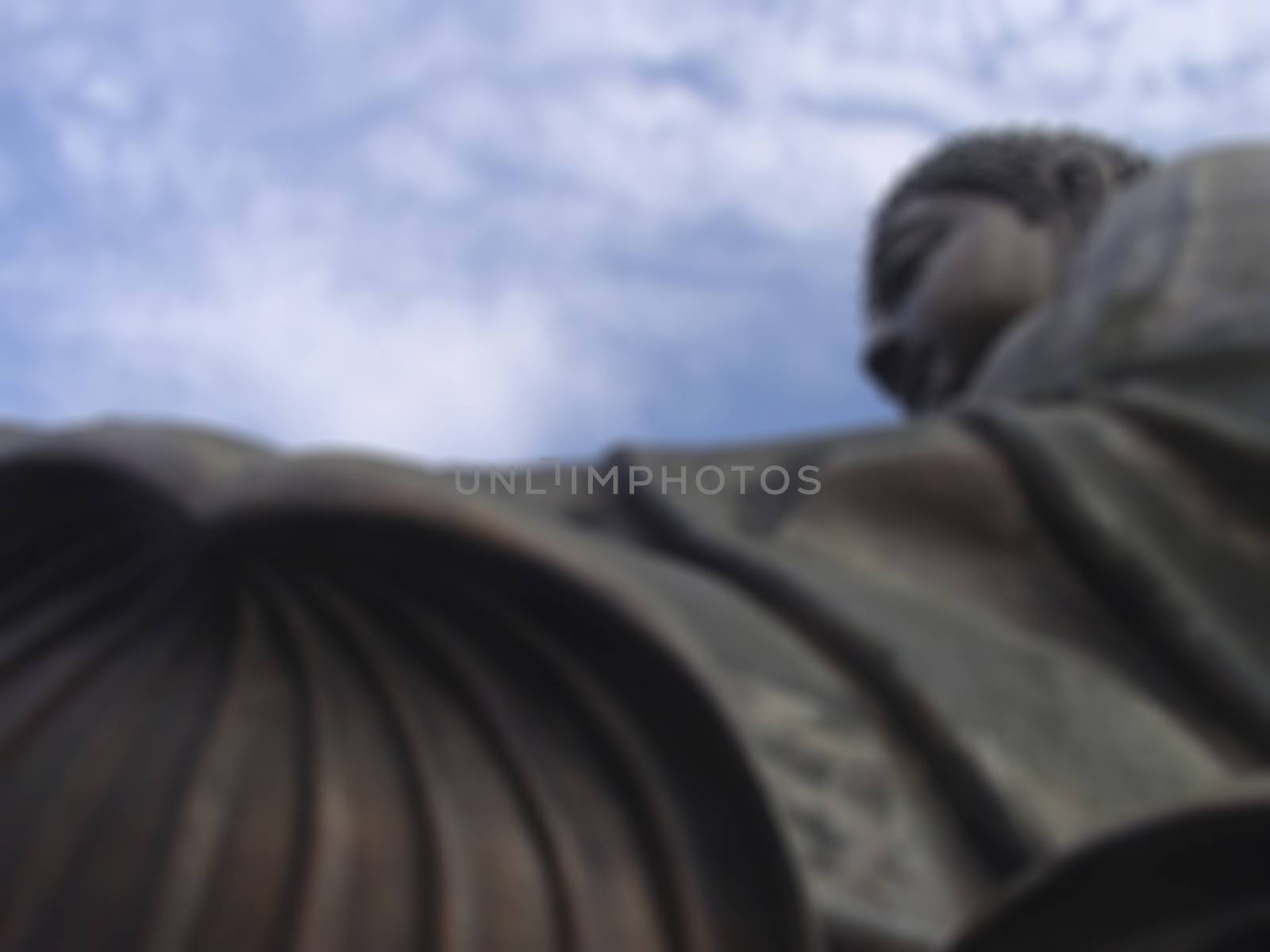 Blurred Tian Tan Buddha statue background, Po Lin Monastery, Lantau Island, Hong Kong, China