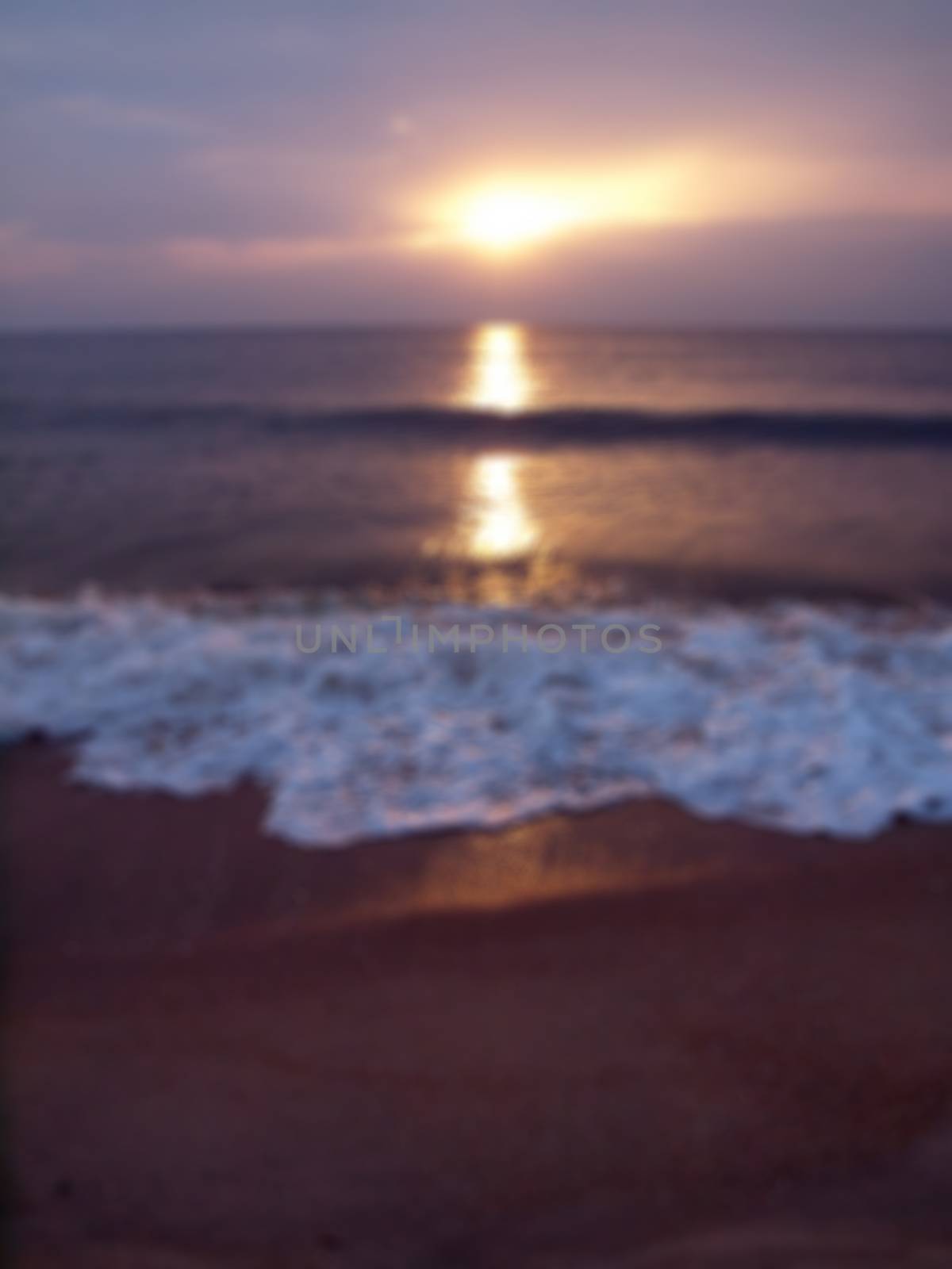 Abstract blurred romantic tropical beach with wave, sea, sun and sky