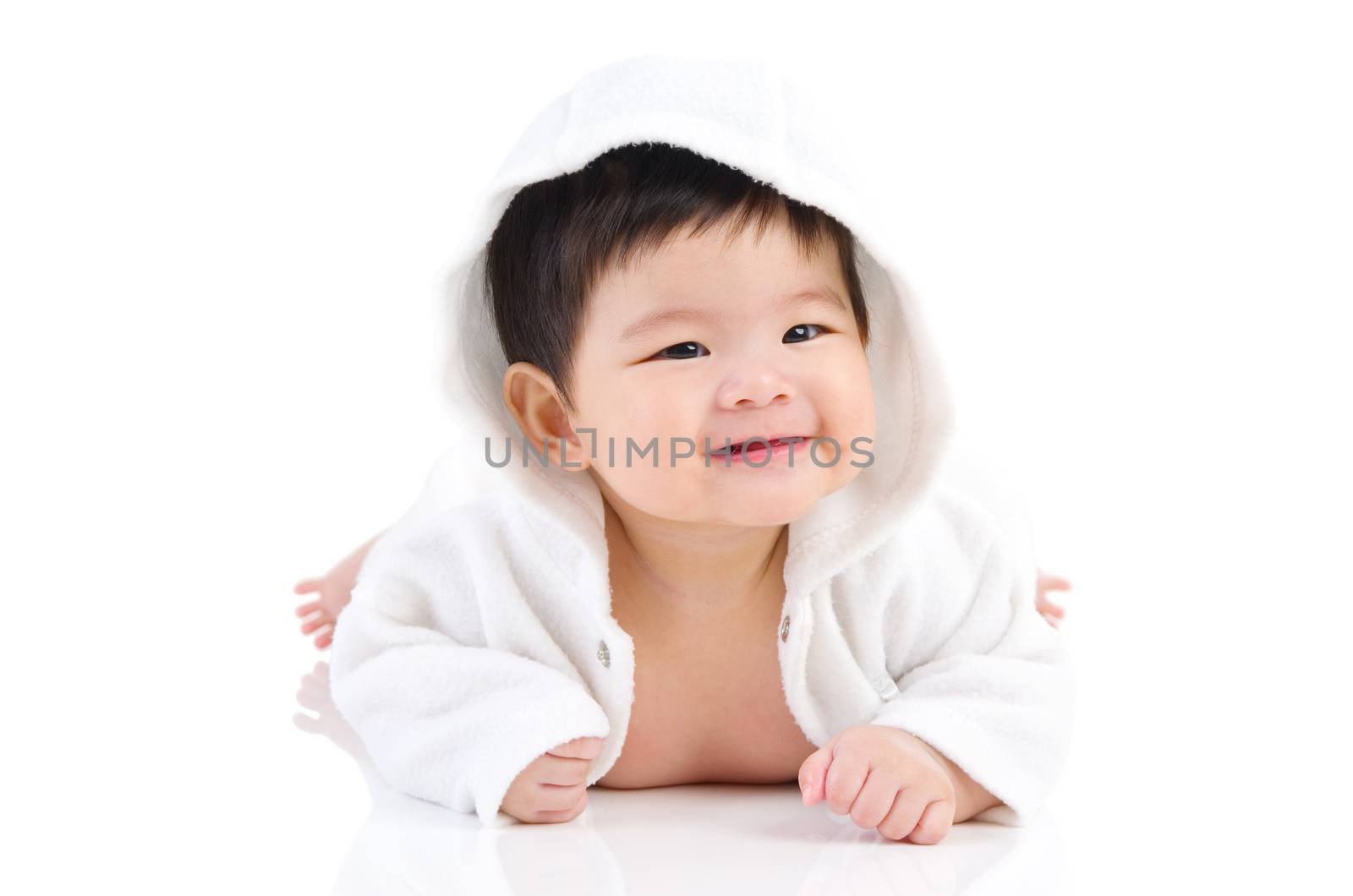 beautiful asian baby girl crawling on the floor