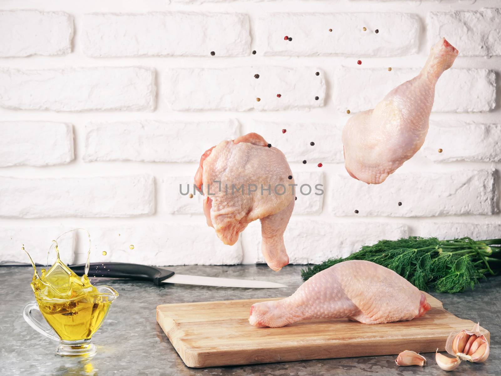 Raw chicken legs levitation. Flying food. Concept for food ingredient. Copy space
