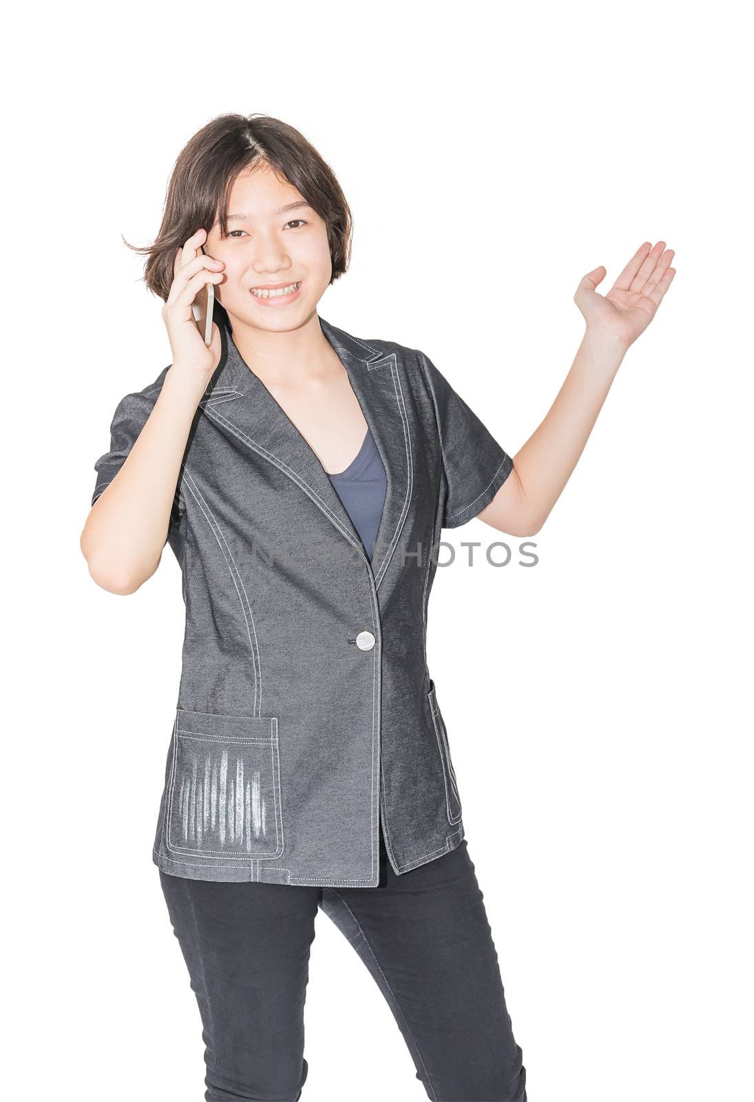 Asian women stand with using mobile phone isolated over white background