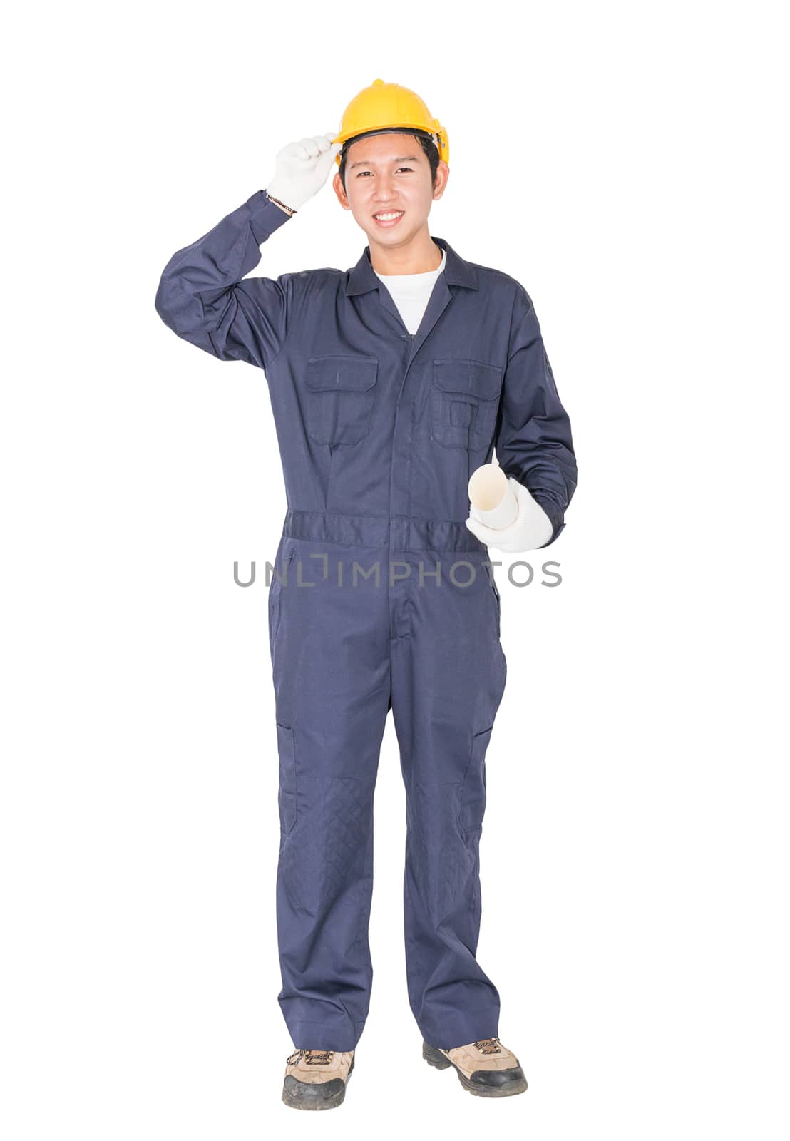 Young worker with yellow helmet holding blueprint isolated over white background