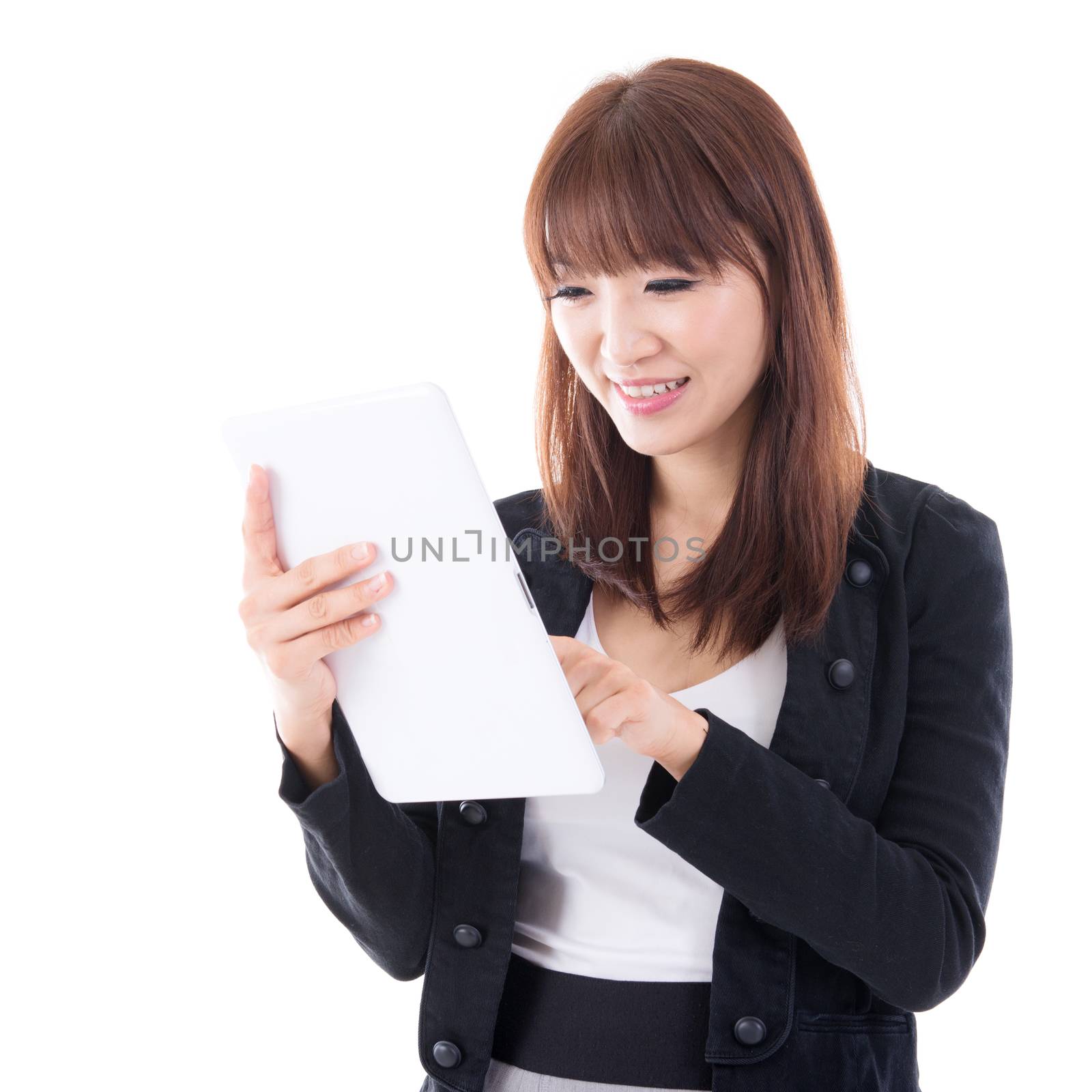 Young Asian female using digital computer tablet, isolated on white background.