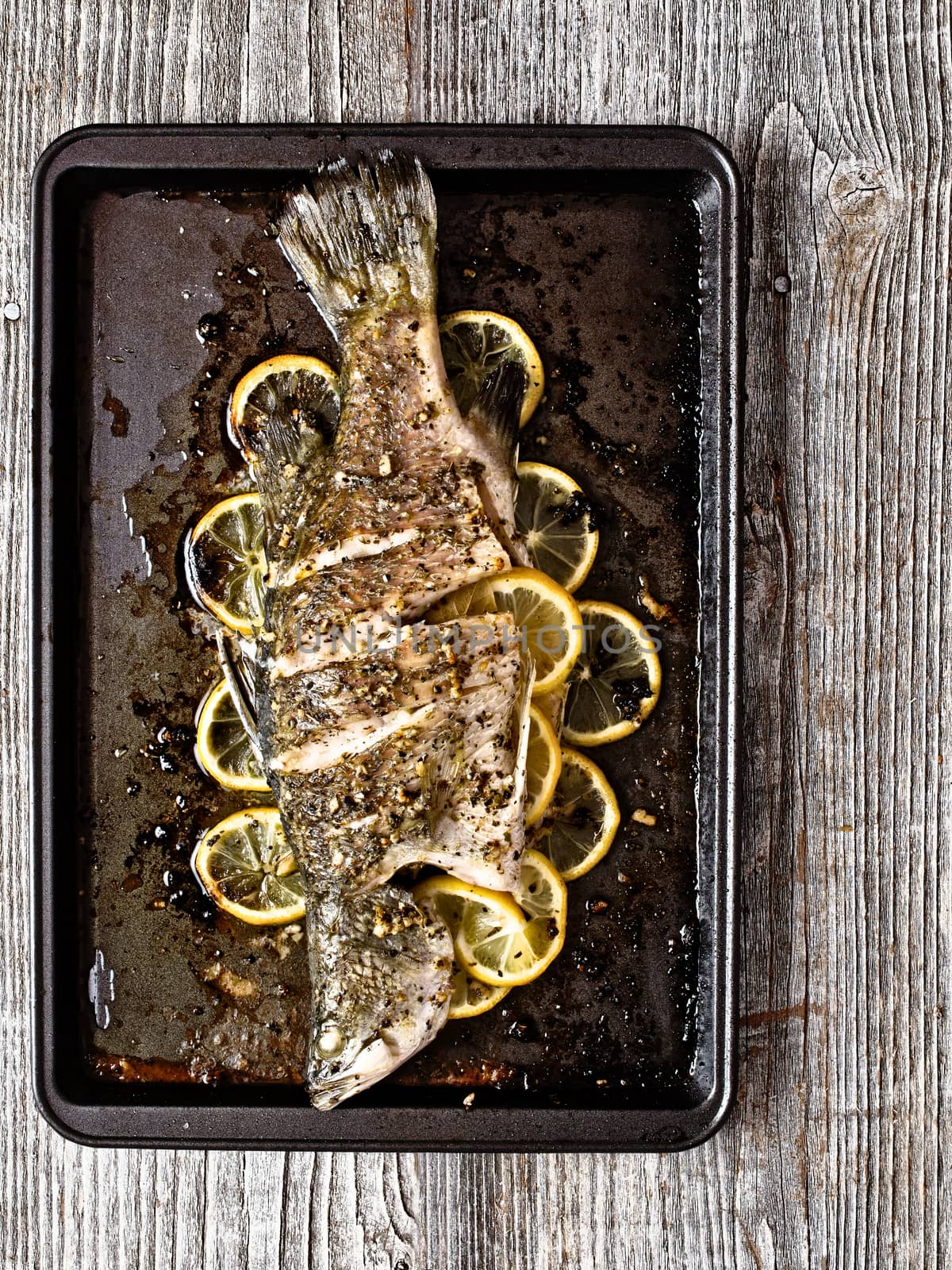 close up of rustic baked fish