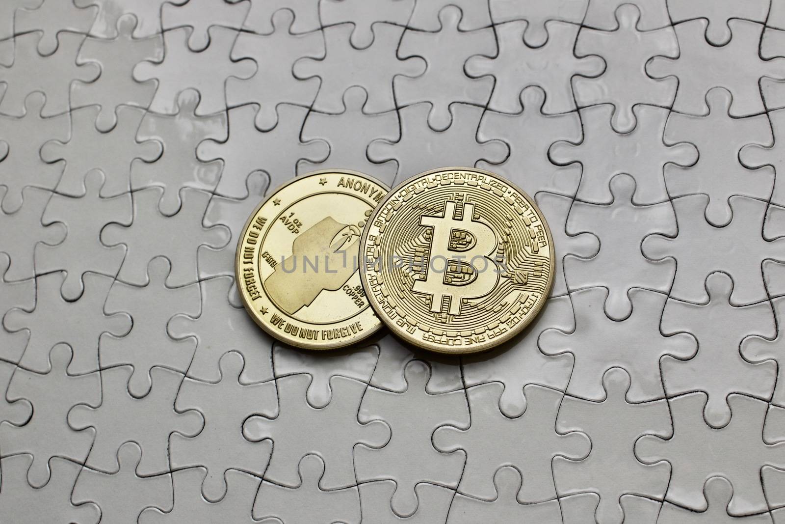 Bitcoin coins on puzzles