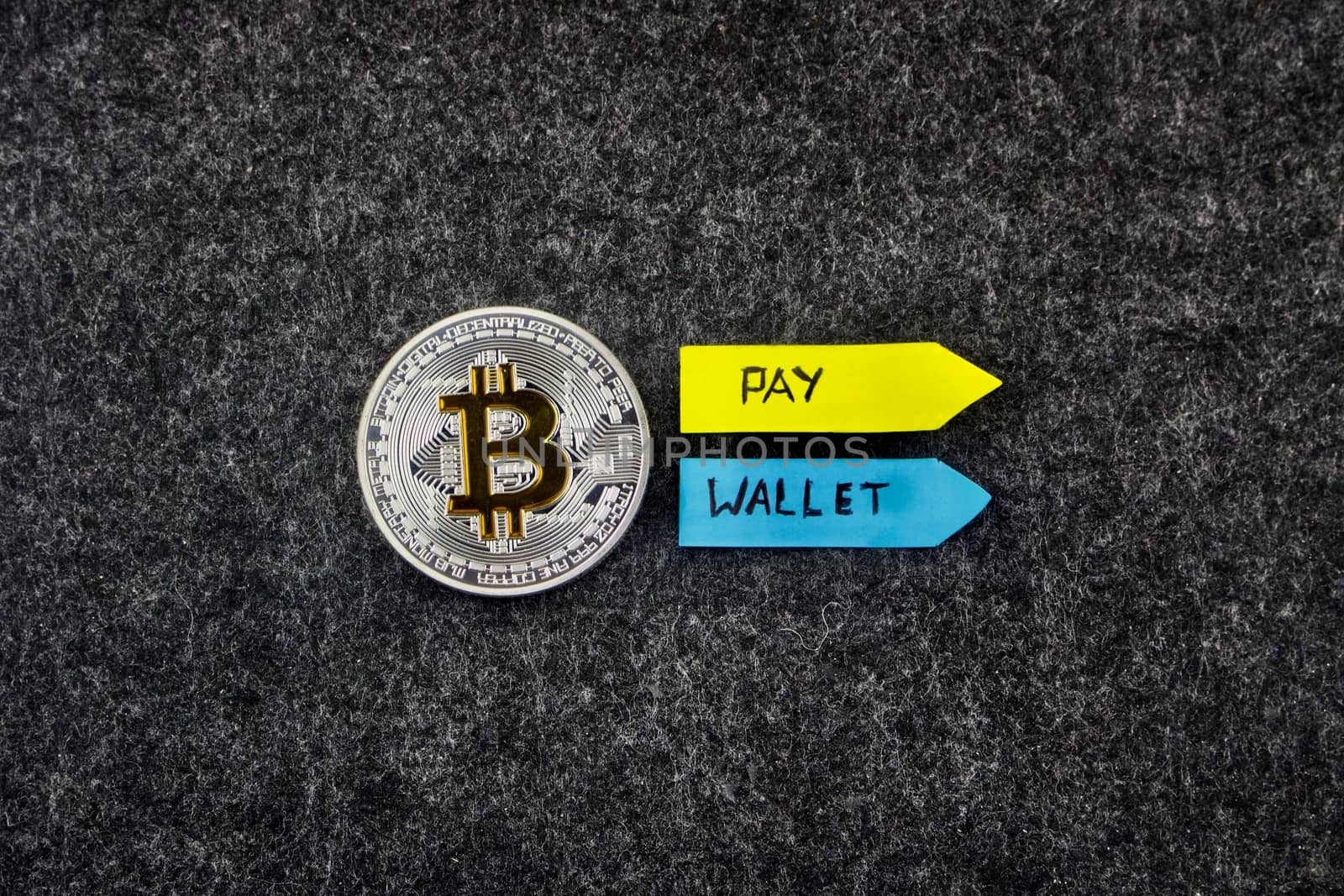 Digital currency silver bitcoin coin with arrows. Pay and wallet.