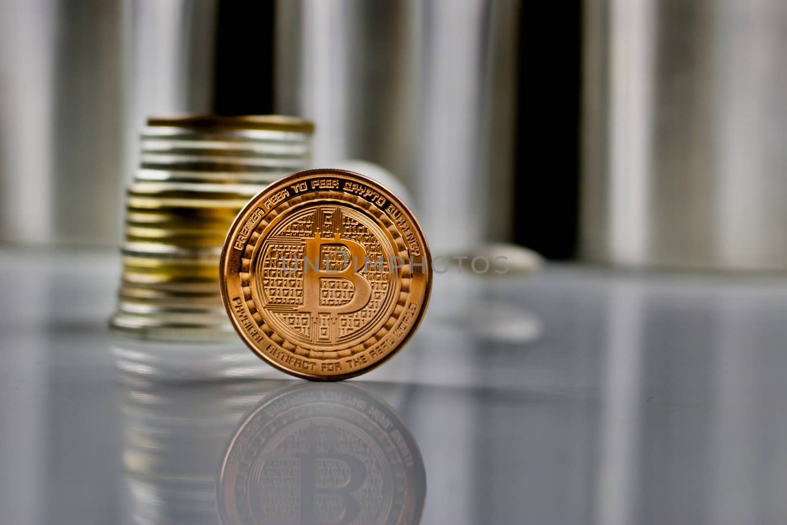 Cryptocurrency physical brass bitcoin coin near money