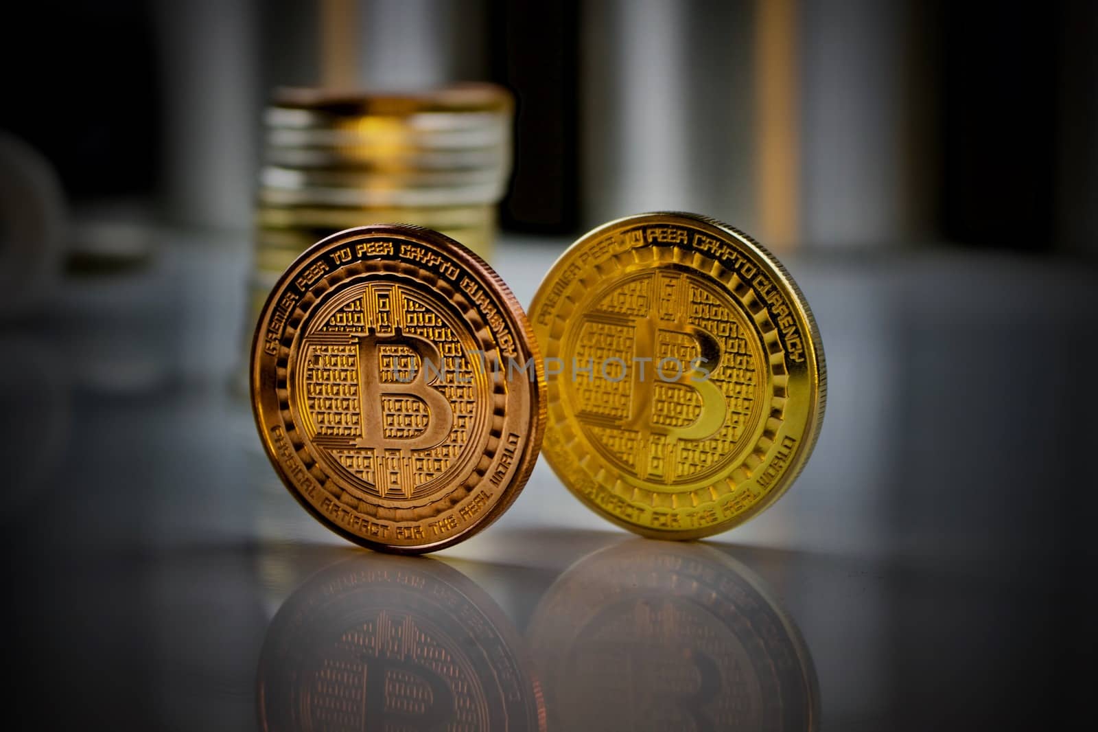Digital currency brass and gold bitcoin coins.