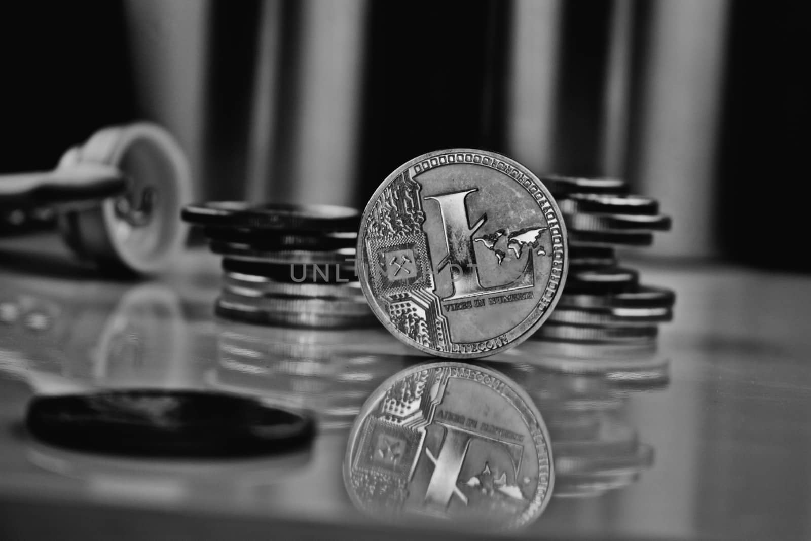 Cryptocurrency physical silver litecoin coin near money