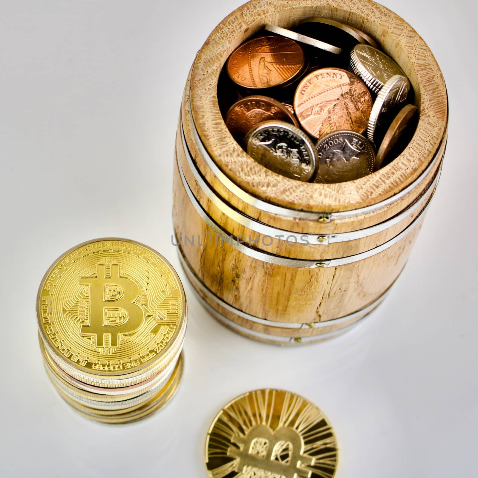 Whiskey barrel and gold cryptocurrency coins