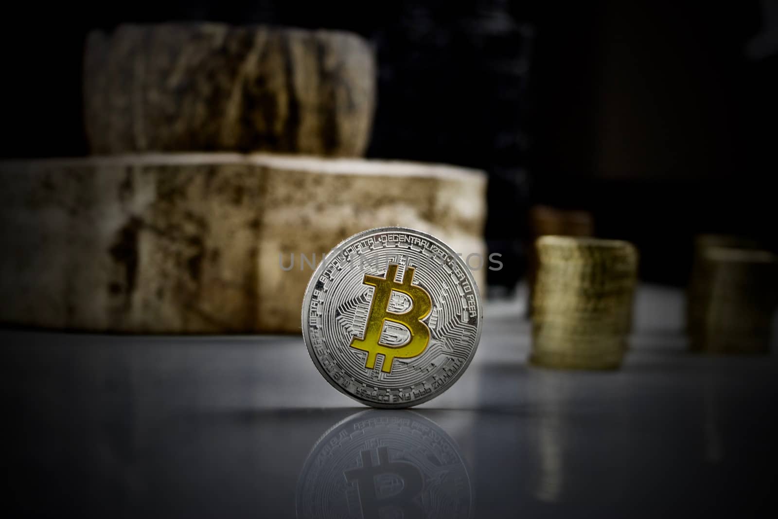 Cryptocurrency physical silver bitcoin coin with yellow sign