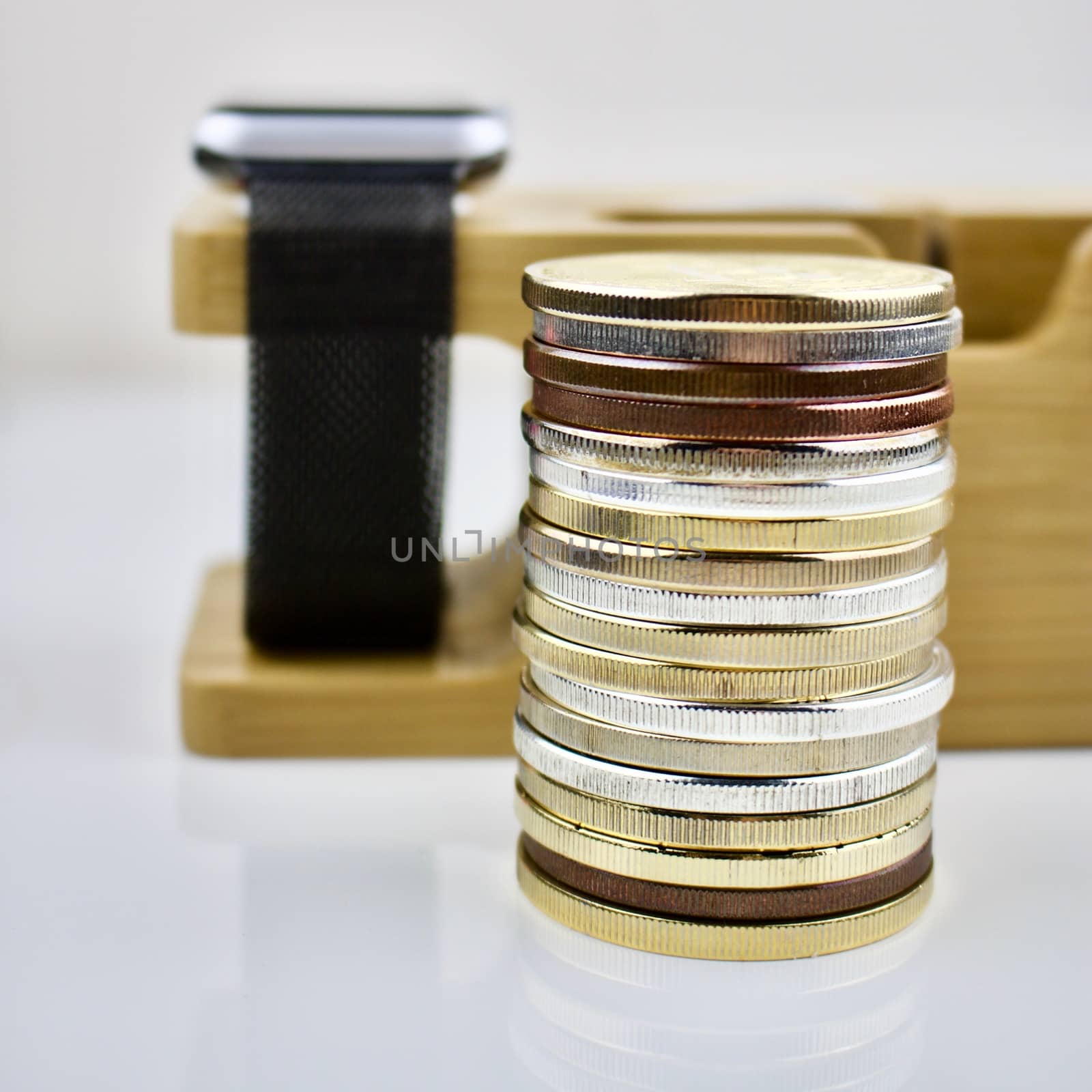 Brass, silver and gold coins on the table