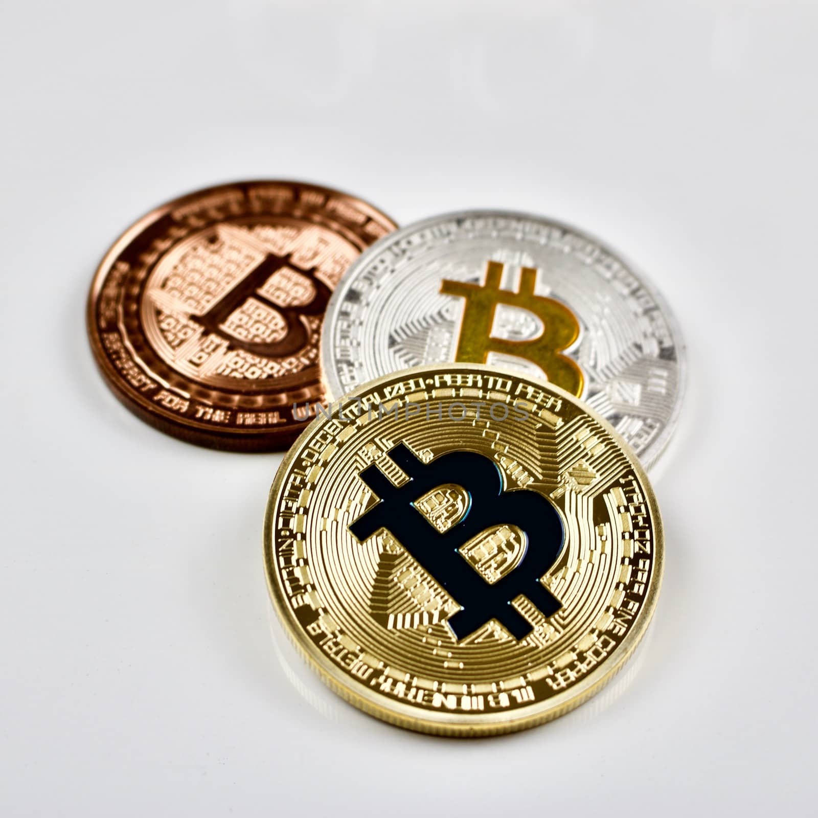 Cryptocurrency physical gold, silver and brass bitcoin coins