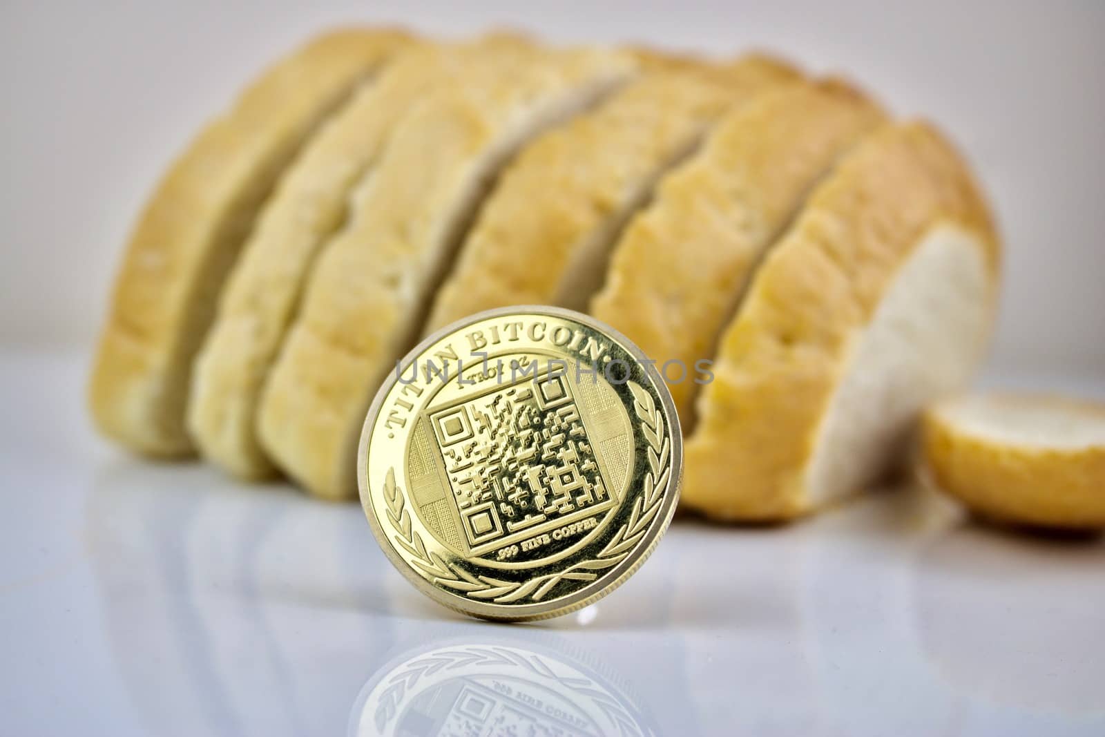 Physical cryptocurrency coin gold titan bitcoin and bread