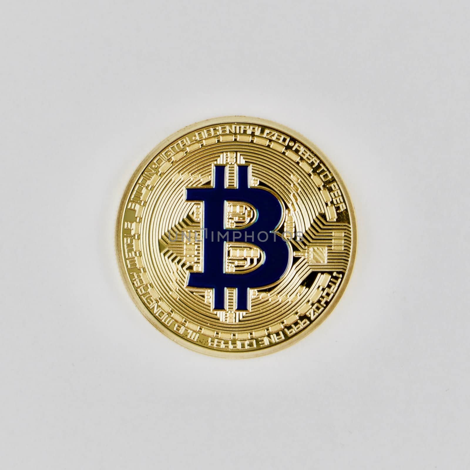 Digital currency physical gold bitcoin coin with a blue sign