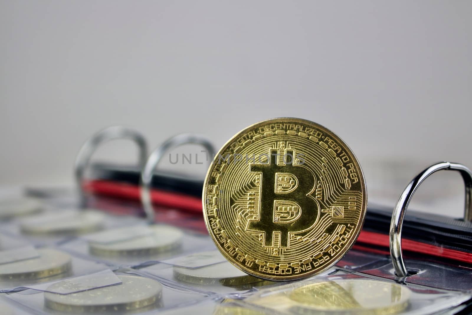 Gold bitcoin digital currency coin in collection.