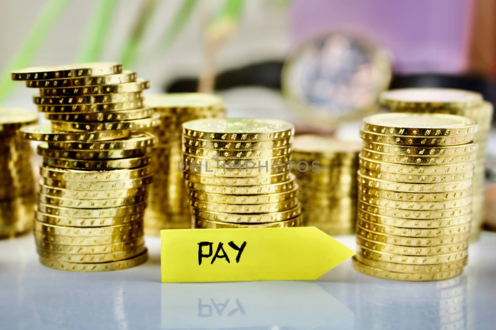 Gold coins concept and pay yellow arrow