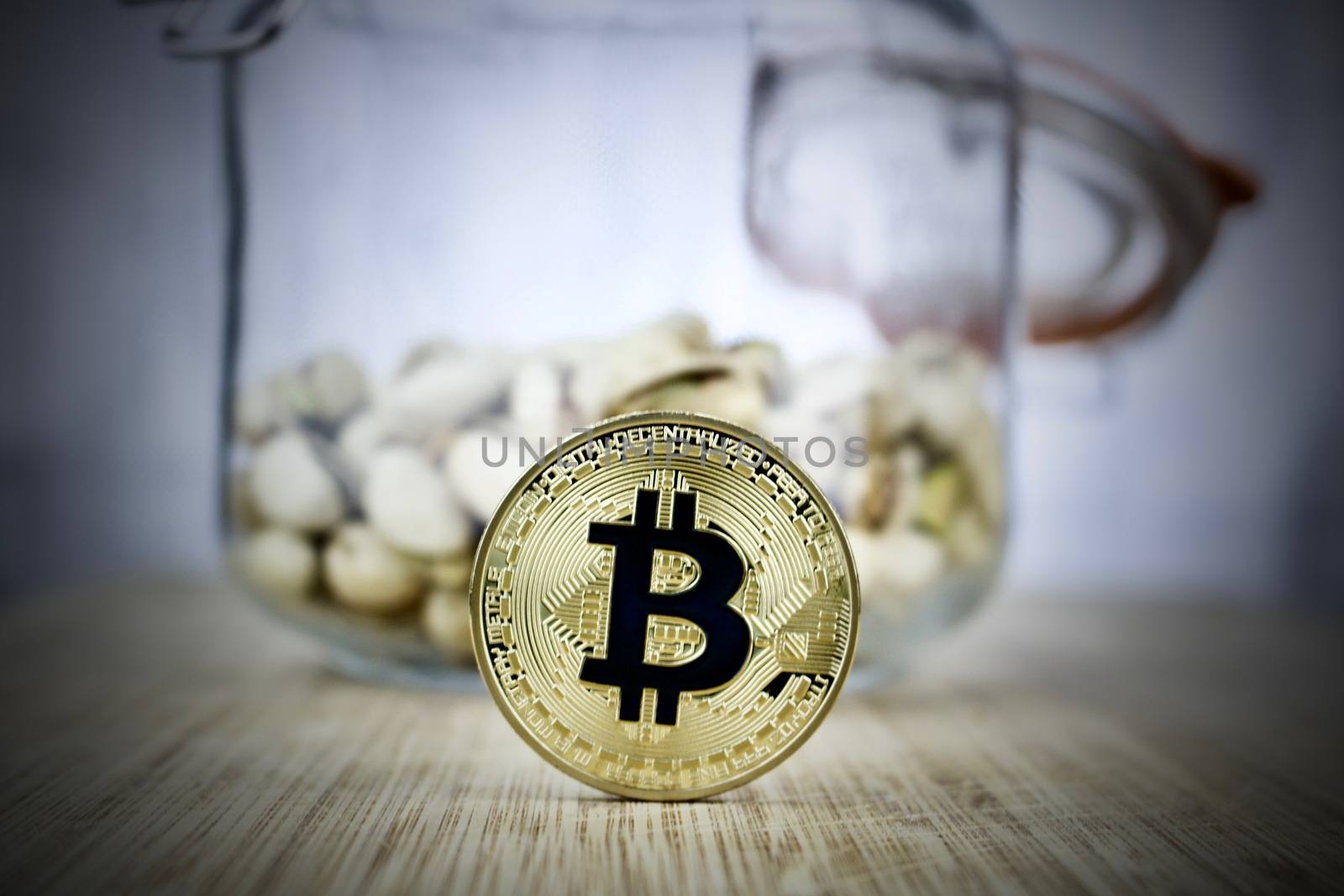 Digital currency gold bitcoin coin with black sign. Kitchen concept.