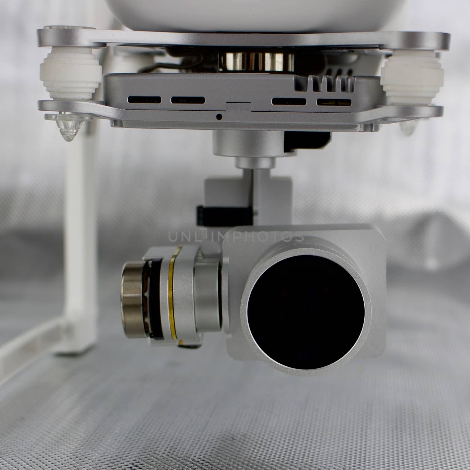 Flying aircraft video equipment. 4K 3 axis gimbal silver camera.