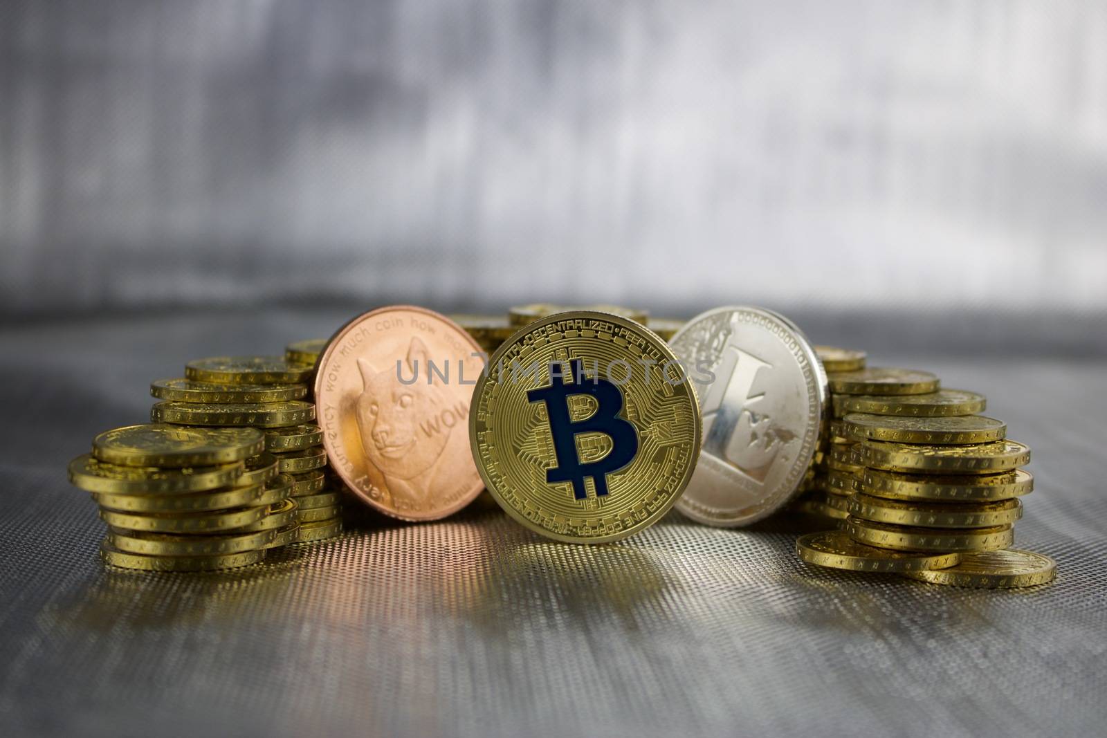 Cryptocurrency physical doge litecoin and bitcoin. Money concept.