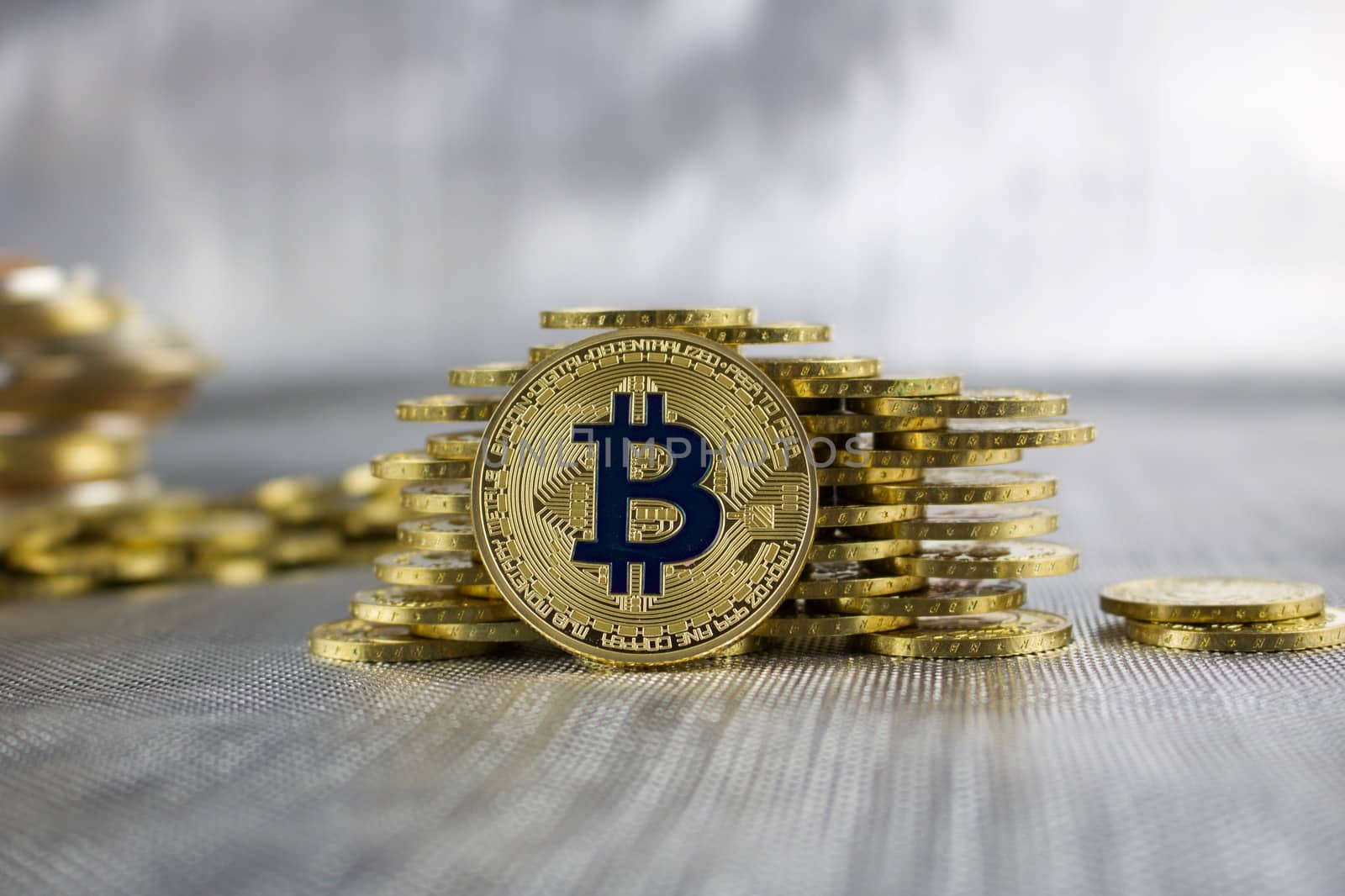Cryptocurrency physical gold bitcoin coin money concept.