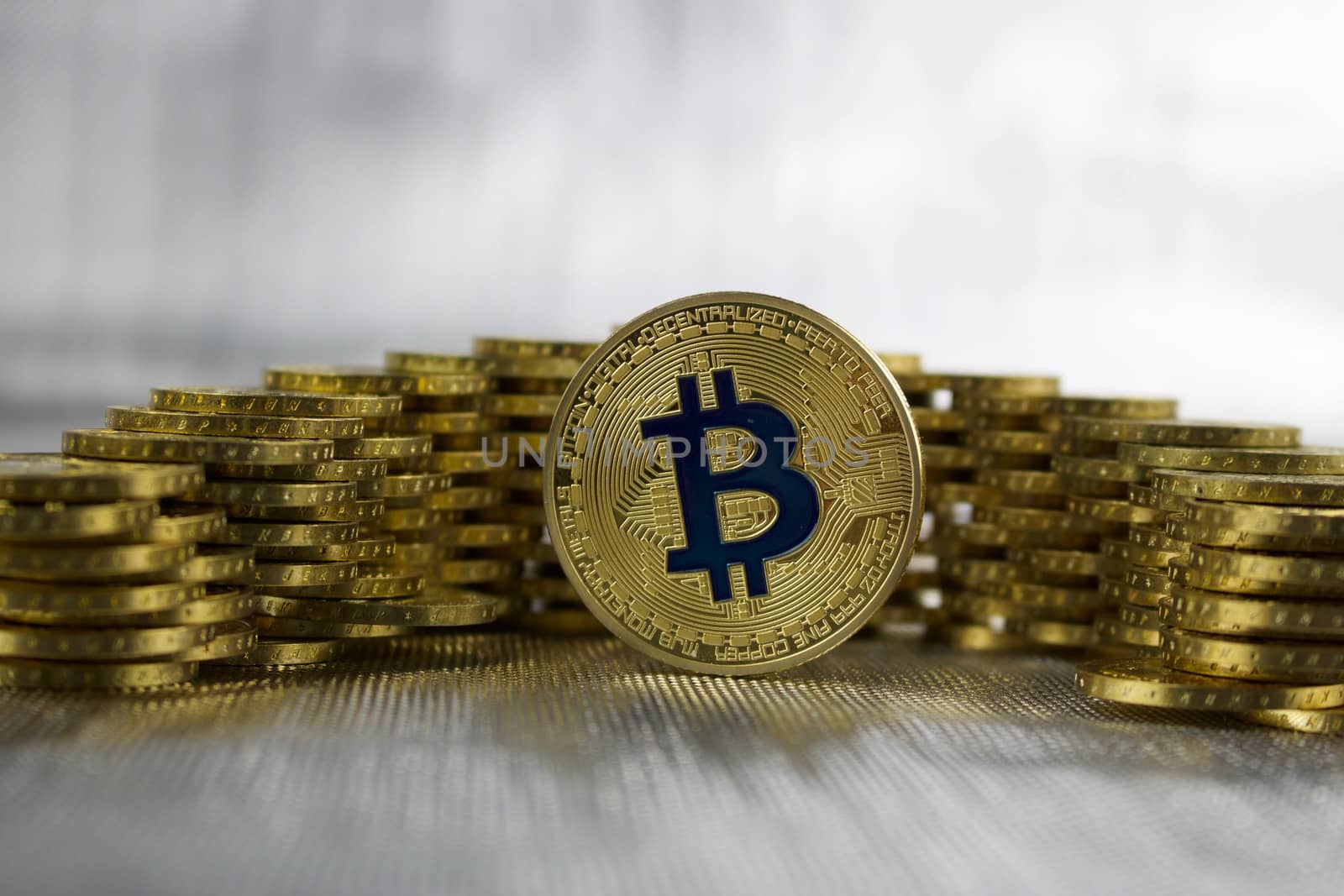 Digital currency physical gold bitcoin coin money concept.