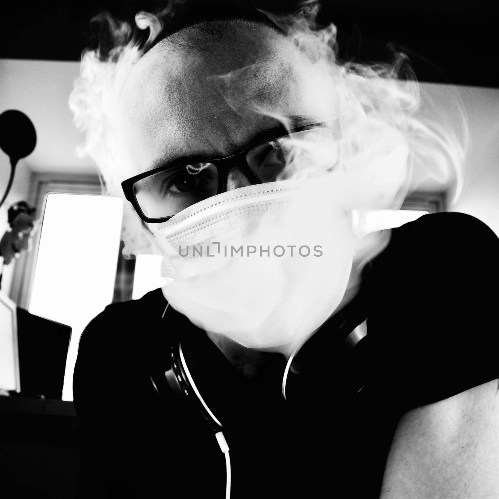 Man smoking with mask by adriantoday